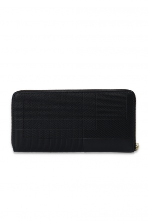 See a unique collaboration with Lacoste which blurs the lines between fashion and sport Leather wallet