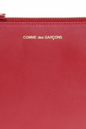 Comme des Garçons Download the updated version of the app