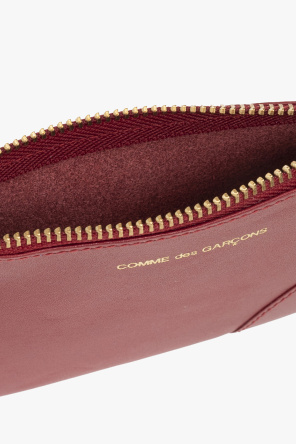 Leather pouch with logo od Comme des Garçons