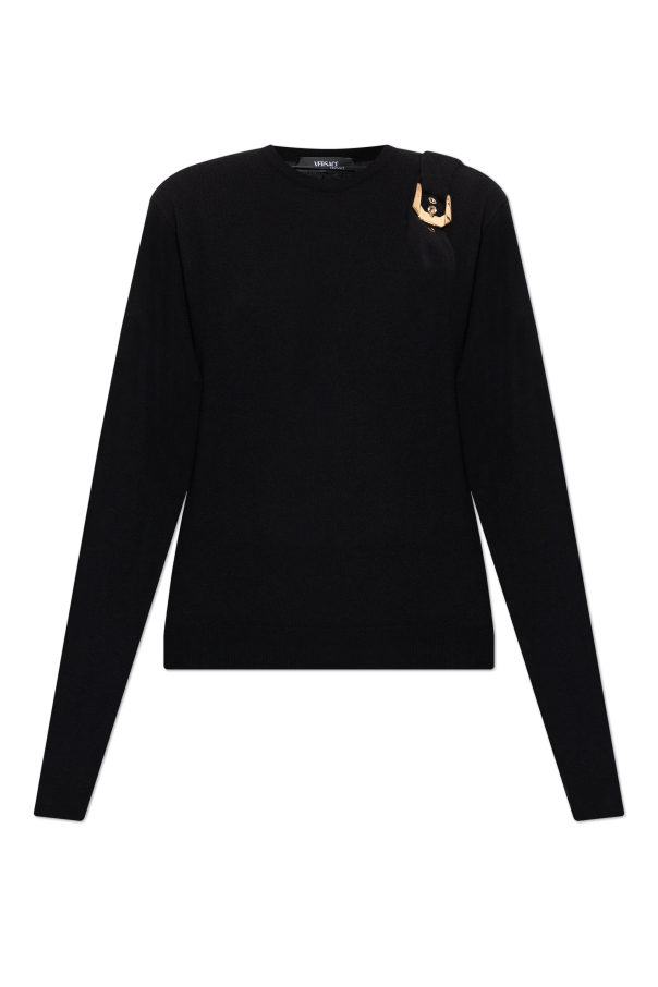 Wool sweater with decorative buckle od Versace