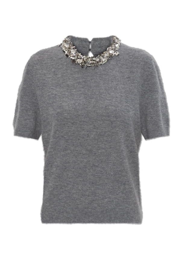 Top with shimmering embellishments at the neckline od Tory Burch