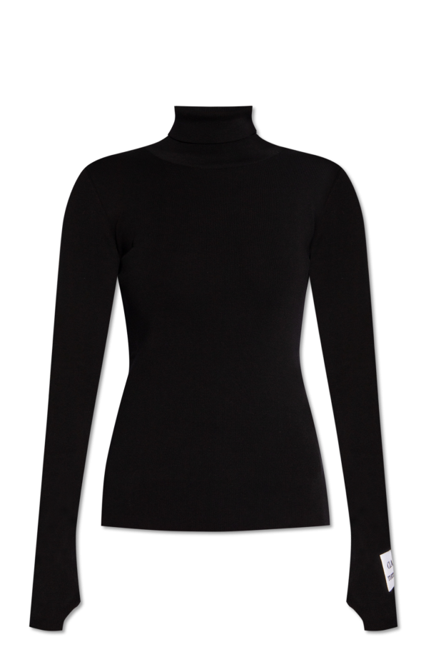 Form-fitting turtleneck top od Moschino