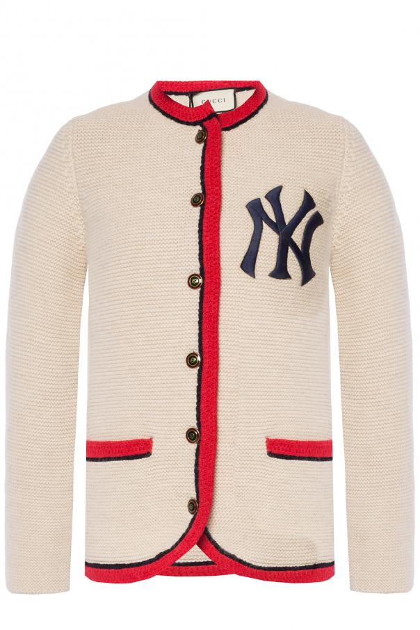Gucci - Attending the debut of Gucci Wooster, A$AP Rocky wore a Gucci Fall  Winter 2018 knit cardigan with Web trim and NY Yankees™ appliqué, jeans  with Web trim, loafers with GG