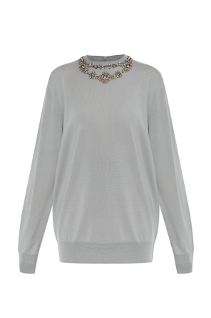 Sweater with sparkling crystals at the neckline