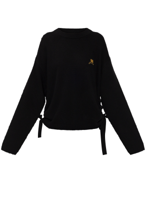 Sweater with side drawstrings