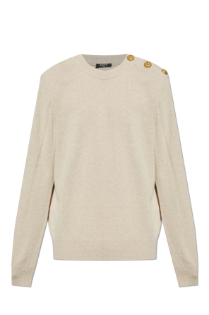 Sweter z zapięciem na zatrzaski na ramieniu