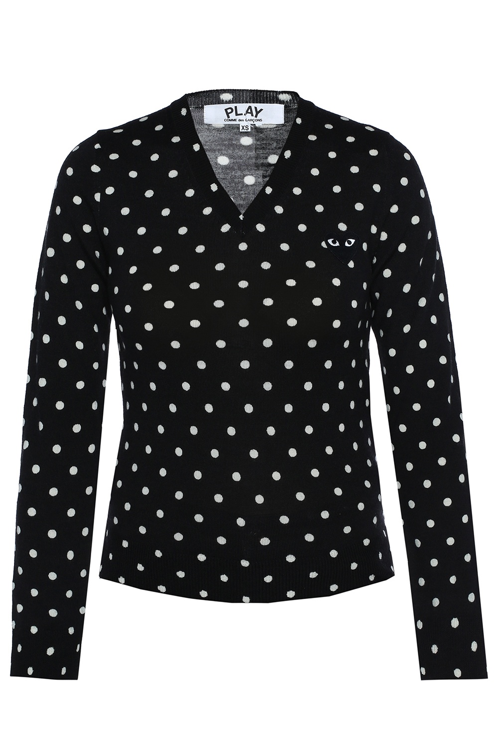 white sweater with black polka dots