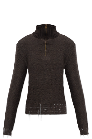 Sweater with decorative threads