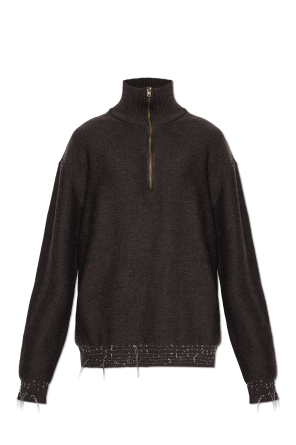 Sweater with decorative threads