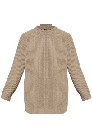 Wool sweater with button fastening