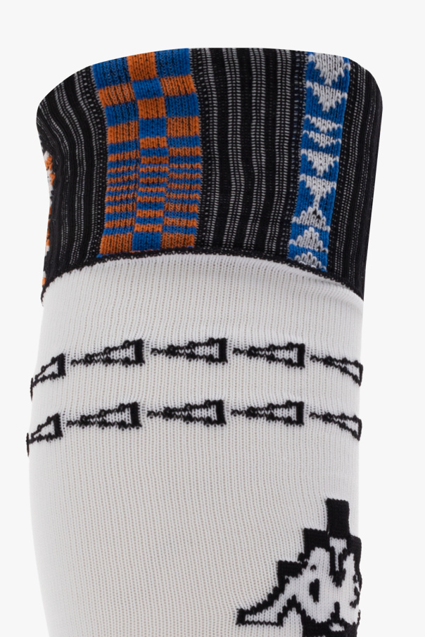 Marcelo Burlon White socks from . This pair features a geometric pattern, logo detail and ribbed cuffs