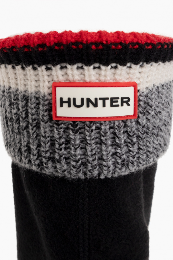 Hunter A shoe with the ability to keep the water out is what you prefer