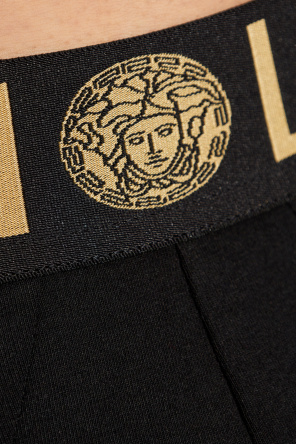 Versace Puma Sweatshirt mit sich wiederholendem Raubkatzen-Logo in Schwarz exklusiv bei ASOS