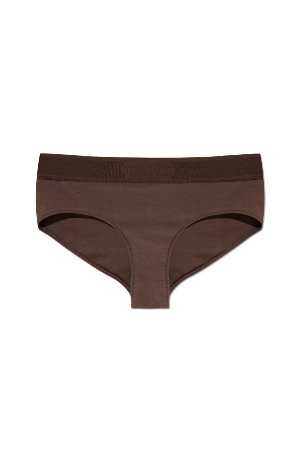 Figures with logo od Tom Ford