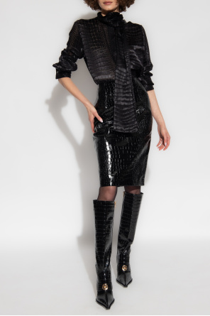 Leather skirt with crocodile effect od Versace