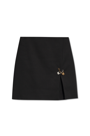 Short skirt with decorative pins