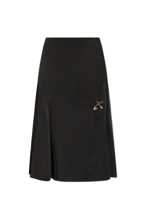 Skirt with decorative safety pins