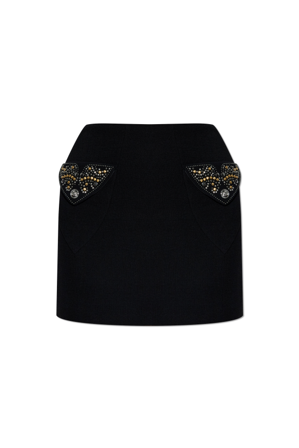 Short skirt with appliqués od Versace