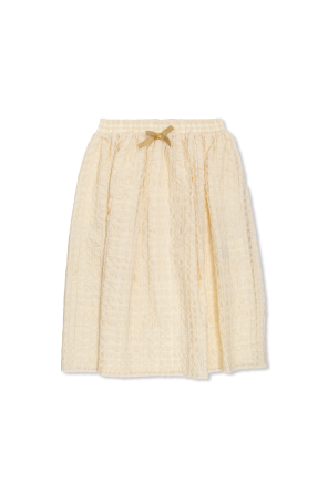 Dress with decorative bow-shaped appliqué