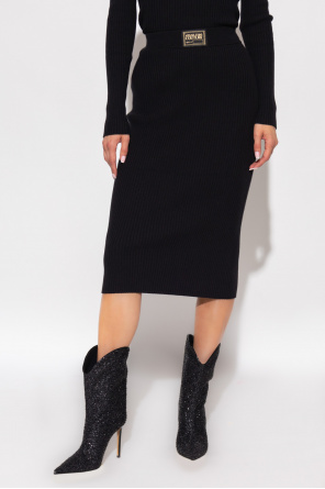 ankle-length jean has a higher rise and a skinny leg for a sleek Pencil skirt