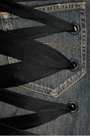 Balenciaga Denim skirt with a decorative ribbon at the back