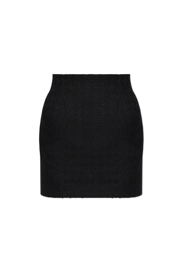 Tweed skirt with sewn-in hip pads od Alexander McQueen