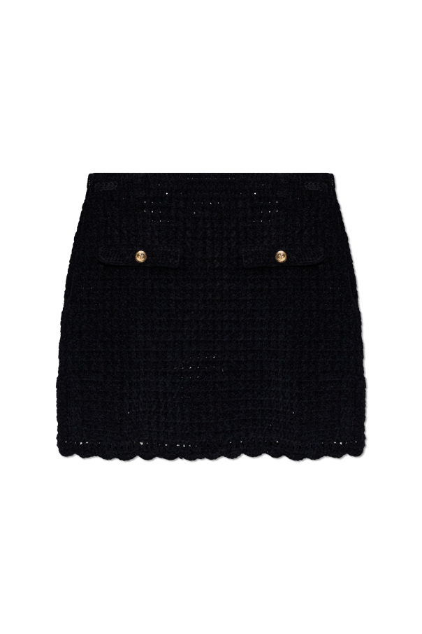 Short skirt with decorative flaps od Ganni