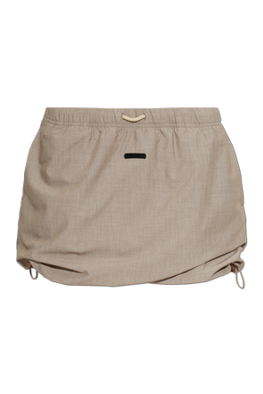 Short skirt with side drawstrings