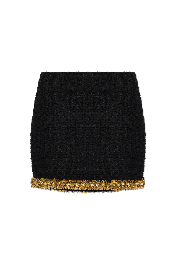 Tweed skirt with appliqués od Balmain