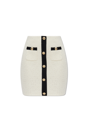 Skirt with shimmering appliqués