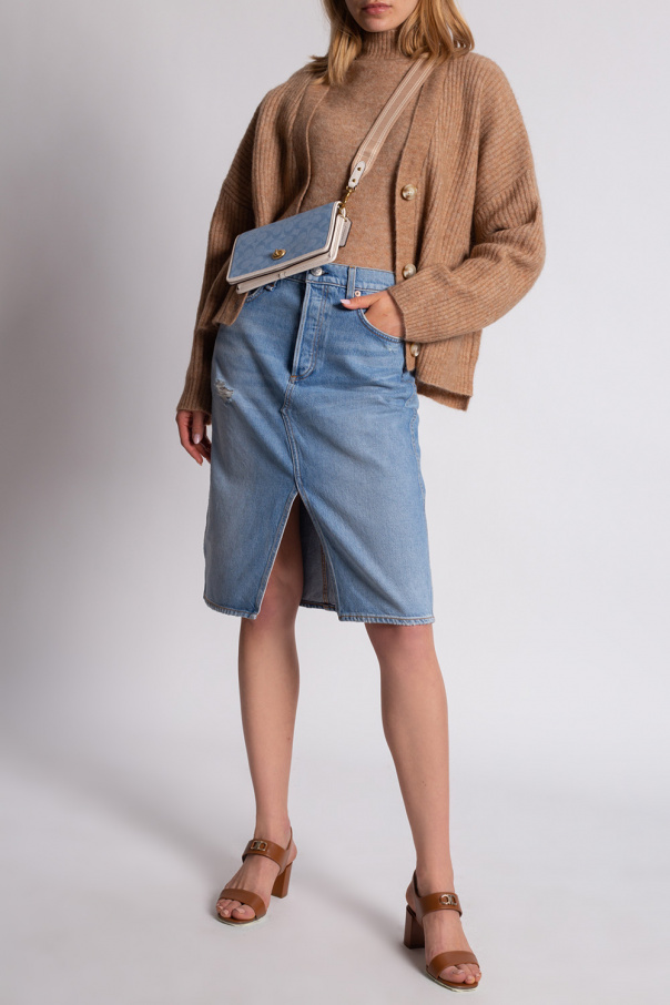 A STEP AHEAD IN STYLISH SHOES  High-waisted denim skirt