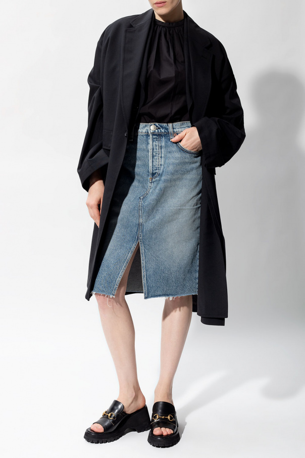 A history of the brand  Denim skirt with slit