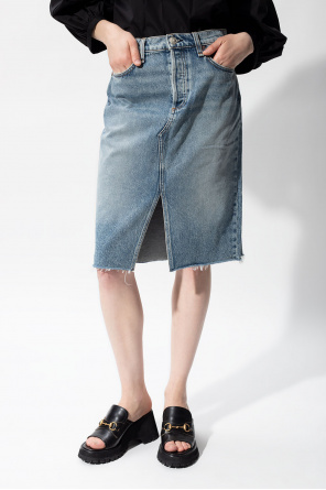 A history of the brand  Denim skirt with slit