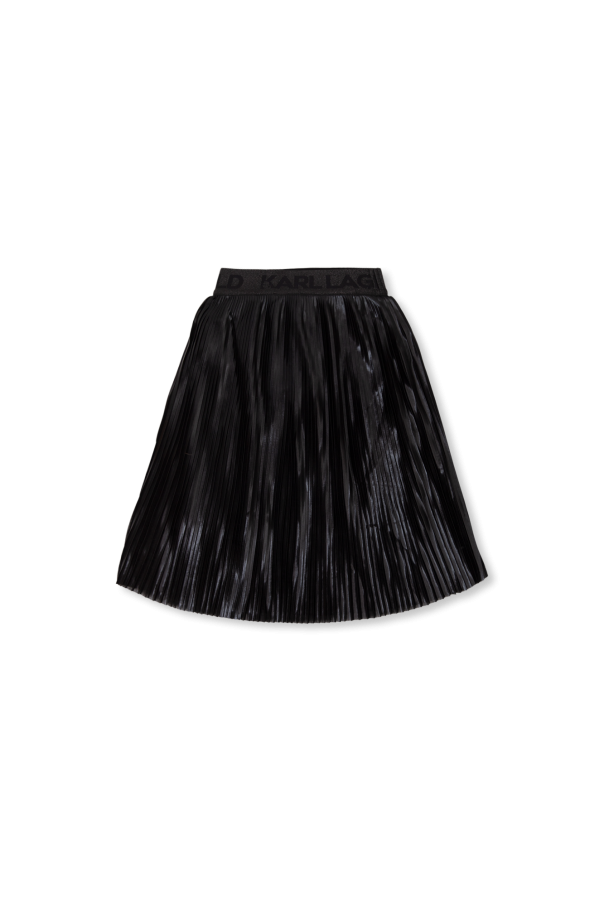See a unique collaboration with Lacoste which blurs the lines between fashion and sport Pleated skirt