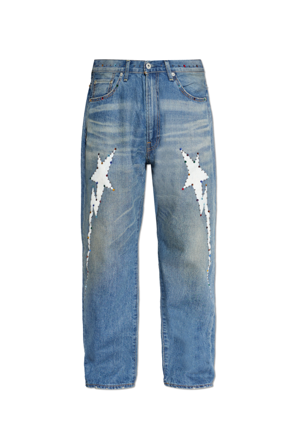 Jeans with shimmering appliqués od A BATHING APE®