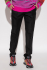 Versace Wool pleat-front trousers