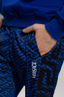 Versace cotton trousers with ‘La Greca’ motif