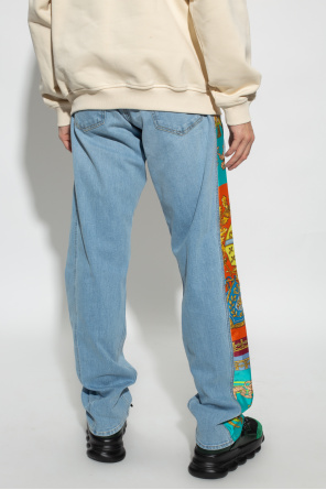 Versace These creamy-coloured sweat pants from