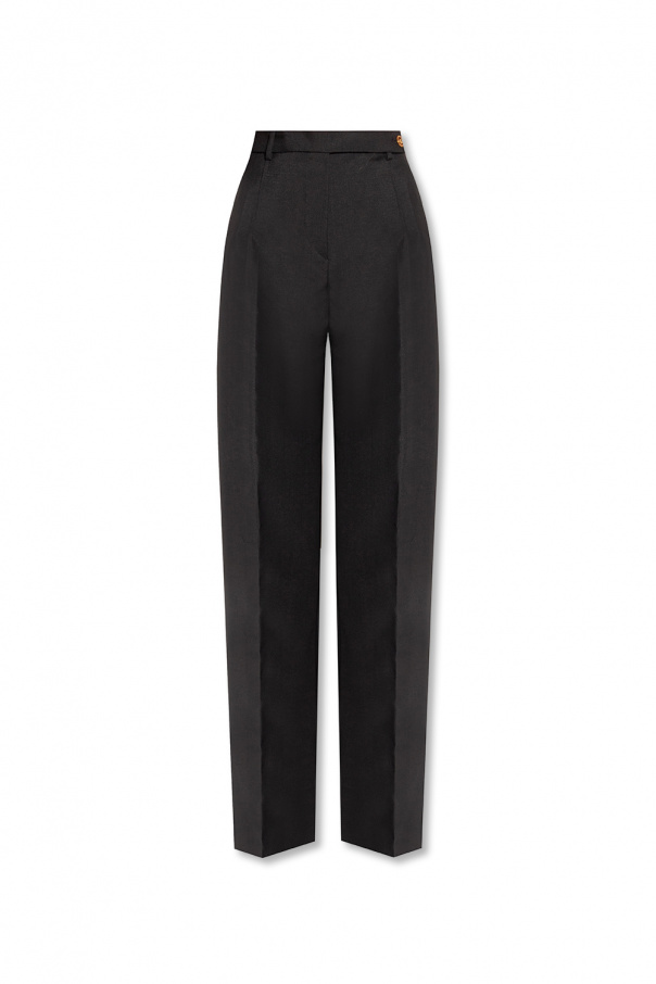 Versace Wool pleat-front Vaqueros trousers