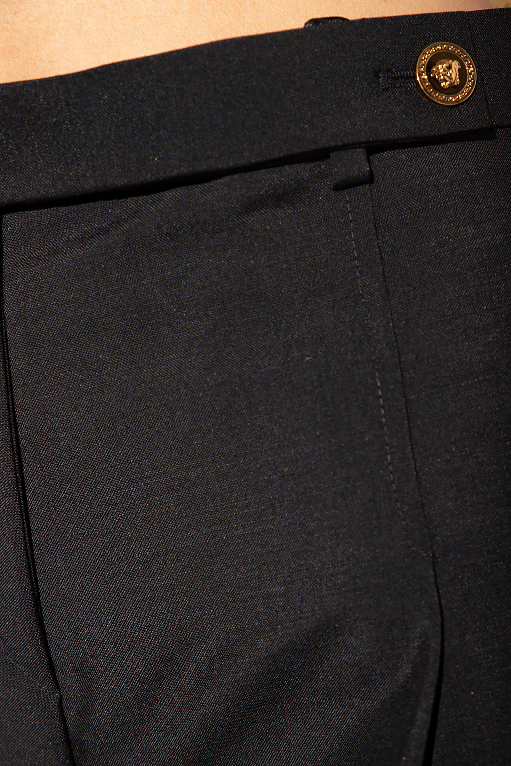 Versace Wool pleat-front Fleur trousers