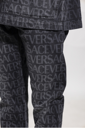 Versace Urban Bliss Enge Jeans-Latzhose in Schwarz