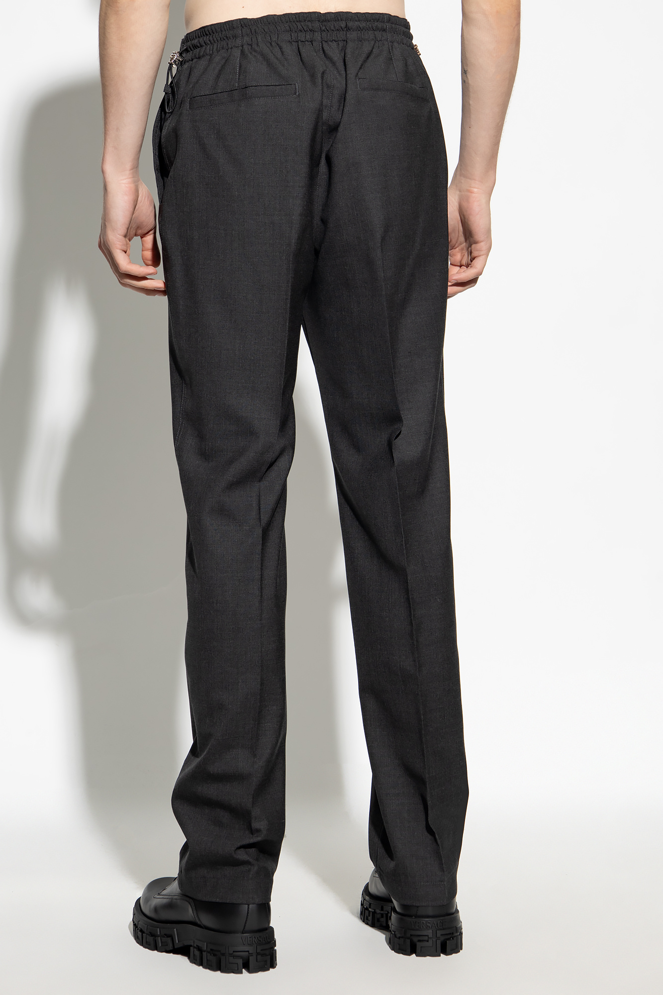 Versace Wool pleat-front trousers