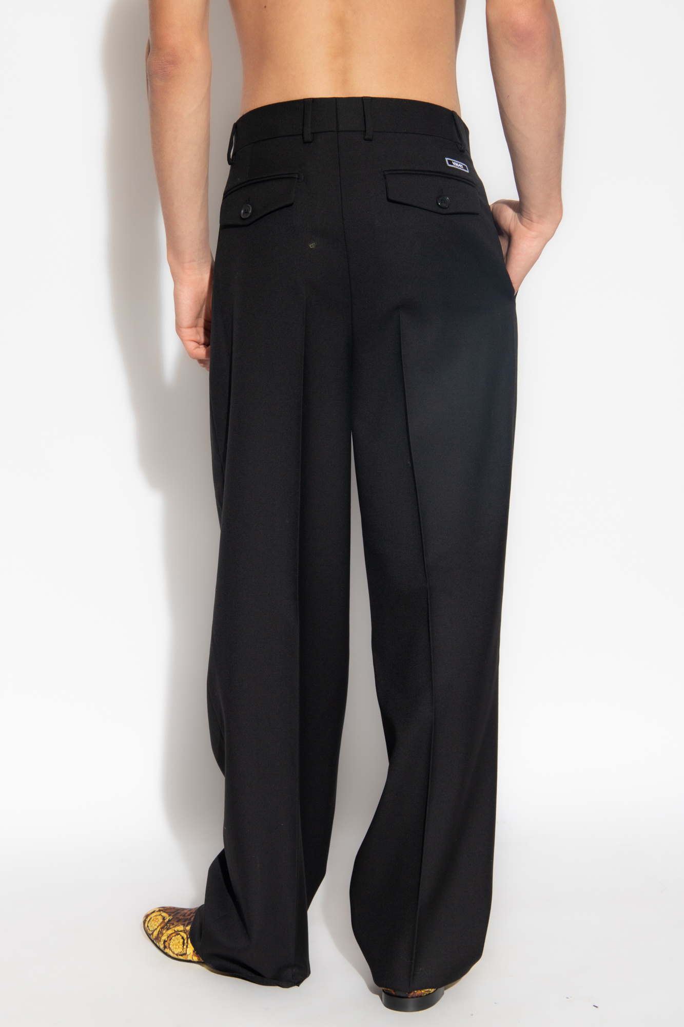 Versace Wool pleat-front trousers