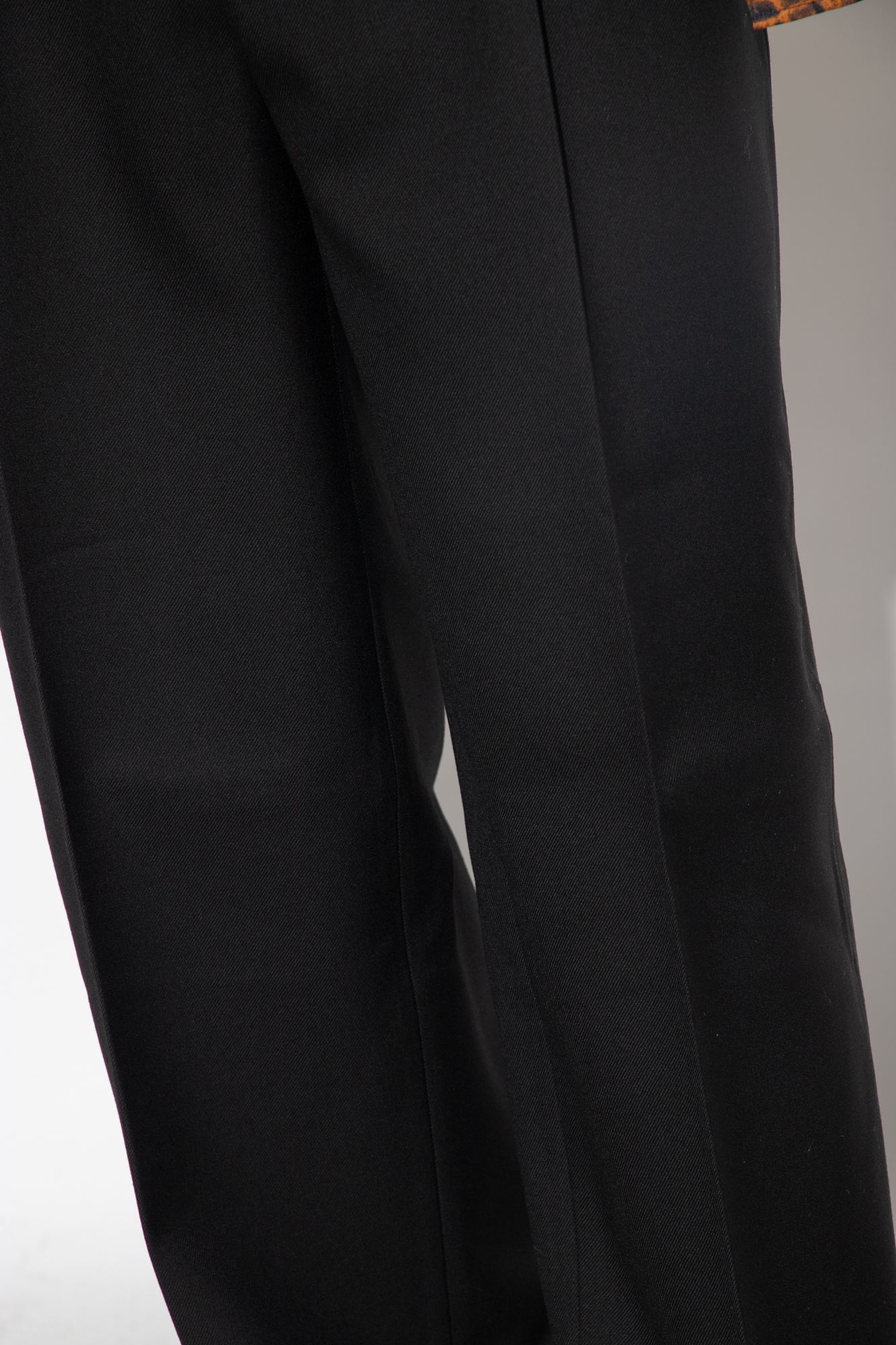 Versace Wool pleat-front trousers