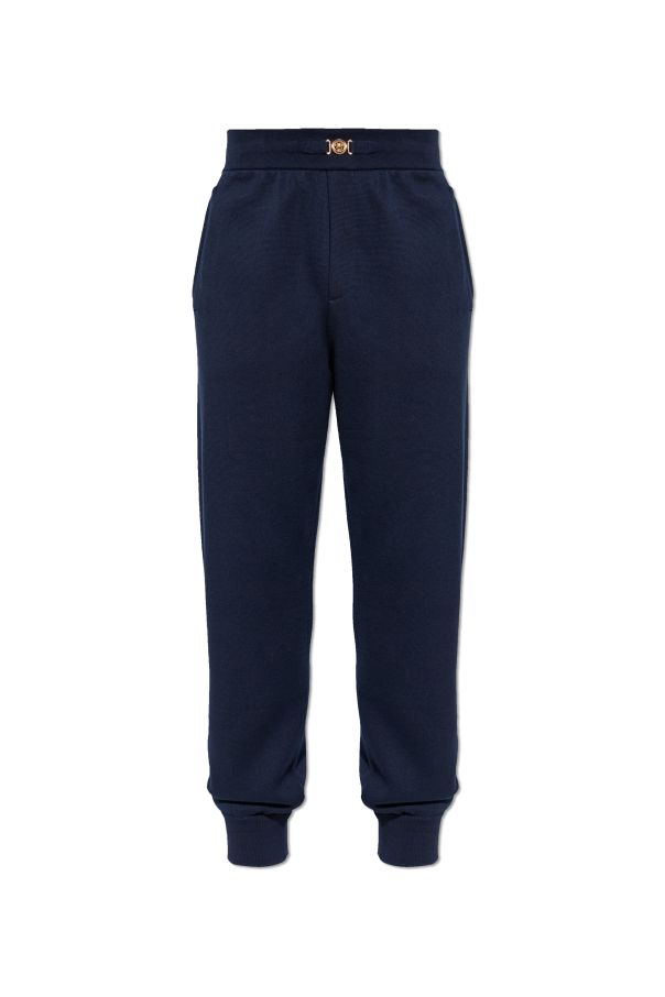 Trousers with cuffs at the legs od Versace