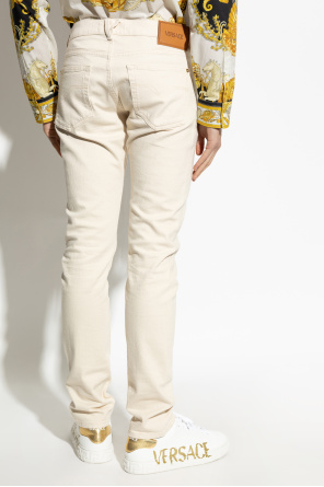 Versace Jeans con perneras estrechas
