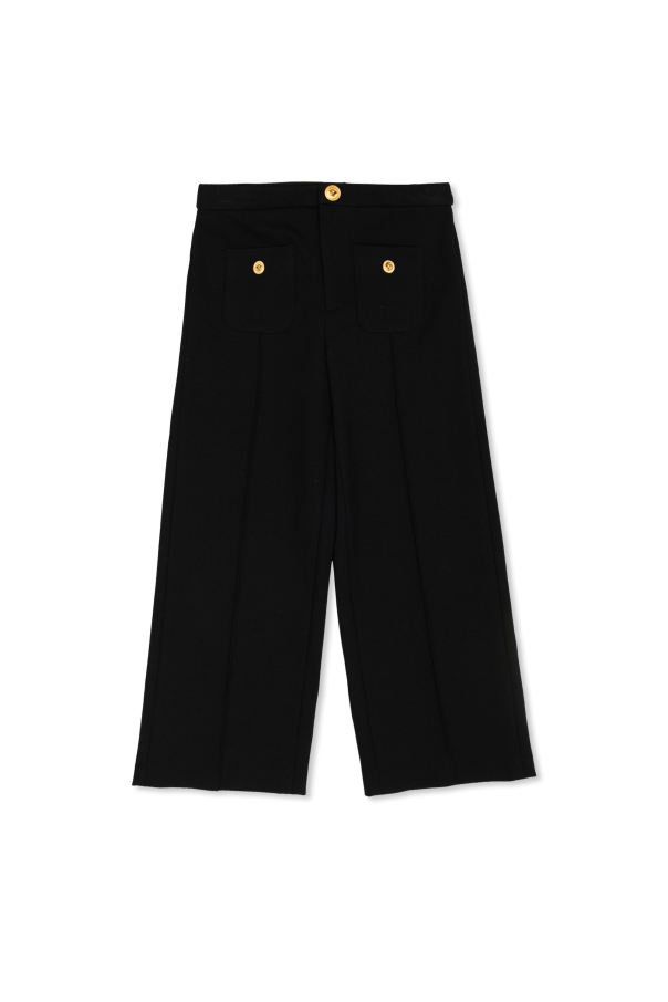 Trousers with stitched seams on legs od Versace Kids