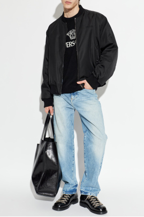 Jeans with a 'vintage' effect od Versace