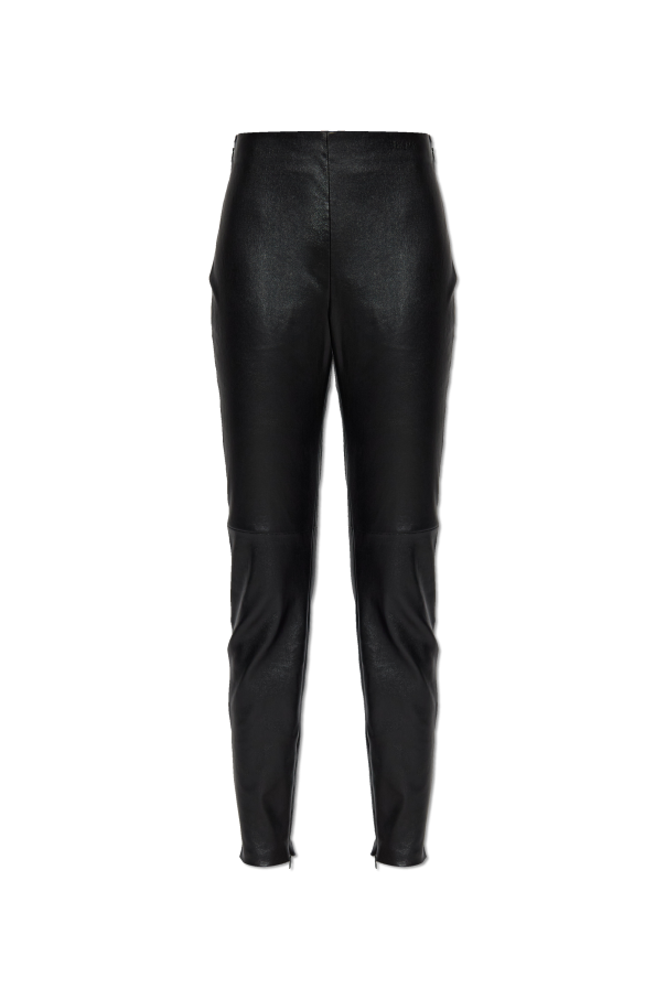 Leather trousers with zippers in the legs od Versace