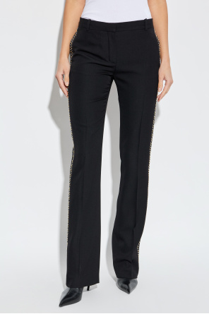 Versace Creased trousers with studs